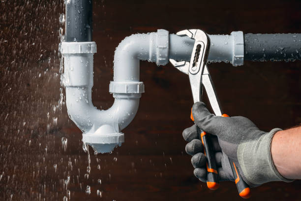 Professional Drain Cleaning technician working in Dracut, MA